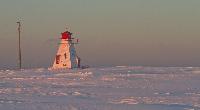Lower Darnley lighthouse sits in the winter enjoying a sunset